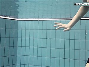 Loris blackhaired nubile swirling in the pool
